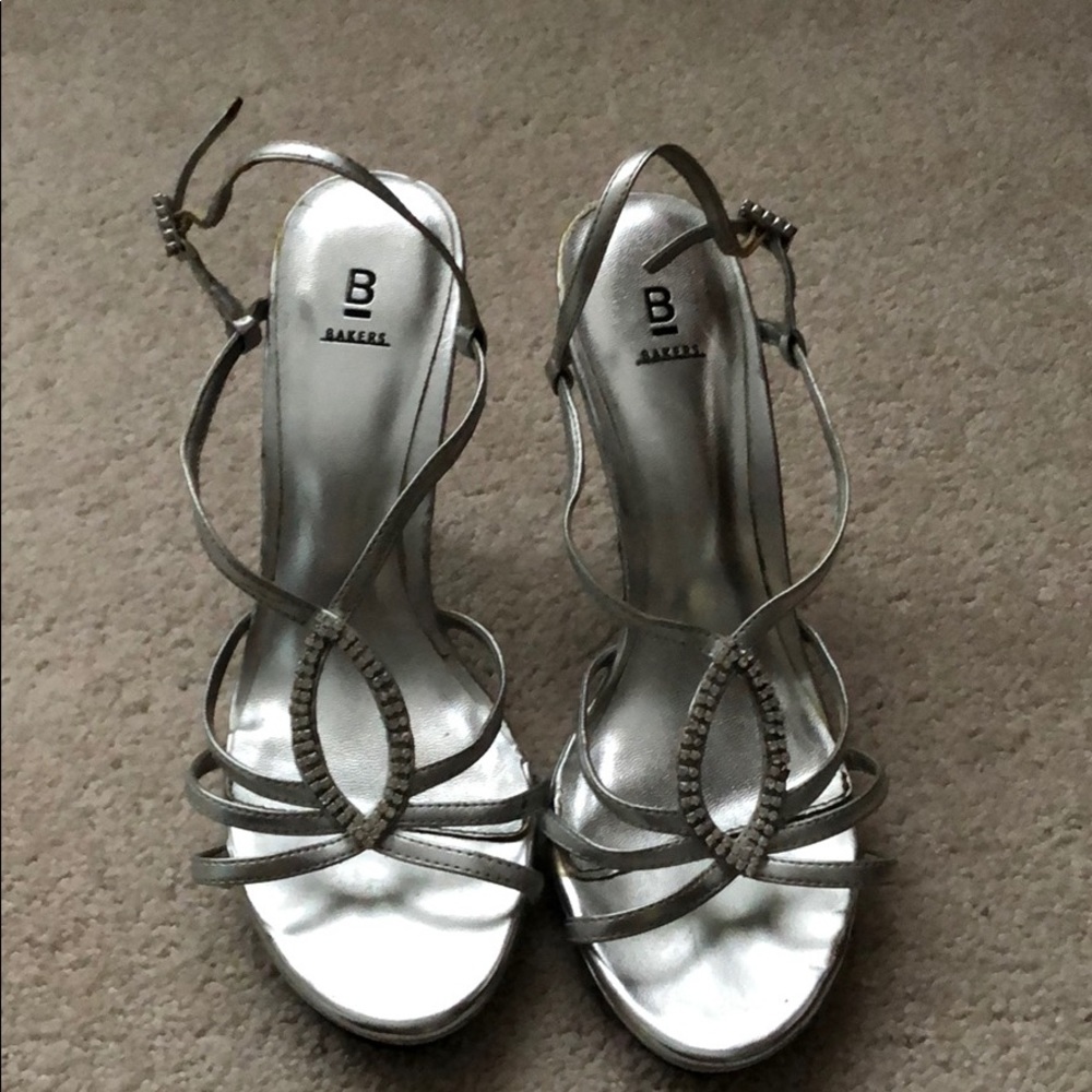 Silver strappy sandals with crystal embellishment